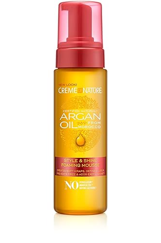 Creme of Nature Argan Oil, Mousse Coiffante à l’Huile d’Argan du Maroc, Mousse Cheveux Bouclés, Frisés et Crépus, Produit Coiffant Brillance et Hydratation, Sans Rinçage, Produit Cheveux - 207ml